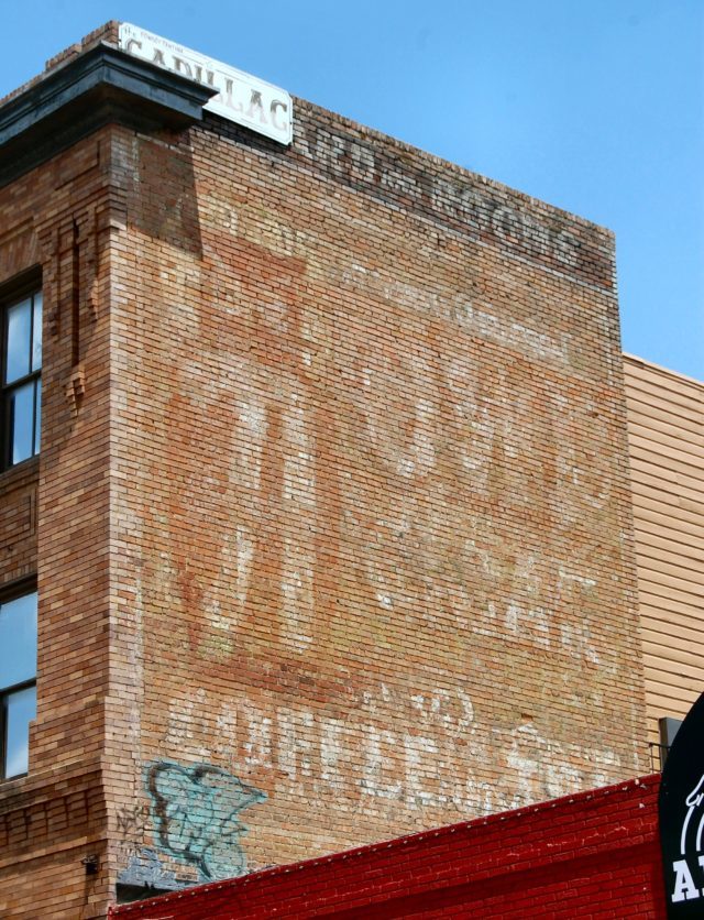 ghost sign owl cigars